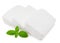 Slices feta cheese with basil isolated on white background. Clipping path and full depth of field