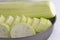 Slices of fresh raw zucchini, courgette, Cucurbita  or squash vegetable marrow in bowl