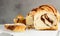 Slices of homemade cinnamon babka or swirl brioche bread. Cinnamon roll bread.