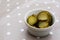 Slices of juicy, sour gherkins in a ceramic pot