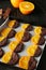 Slices of orange coated chocolate