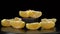 Slices of peeled orange on a black background.