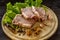 Slices of raw meat. Pork escalope on a wooden board.