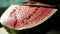 Slices of ripe red watermelon. Beautiful delicious, juicy sliced watermelon, on the table, colorful.