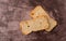 Slices of rye melba toast top view on a maroon background