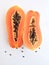 Slices of sweet papaya on white