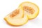 Slices sweet yellow melon with seeds isolated over white background