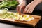 slicing boiled eggs to add into wonton soup