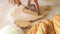 Slicing Bread. Cutting Slice of home Bread on Wooden Boards Cut the Bread