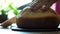 Slicing Bread. Cutting Slice of home Bread on Wooden Boards Cut the Bread With a Knife Cut, Close-Up of white Bread