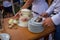 Slicing a cake at a newlyweds wedding