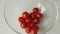 Slicing cherry tomatoes for salad