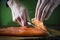 Slicing gravlax salmon with a knife