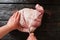 Slicing pork meat piece on wooden background