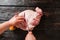 Slicing pork meat piece on wooden background