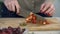 Slicing strawberry with knife