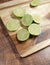 Slicing these vibrant limes in half, ready to add a burst of tangy flavor to my dishes