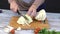 Slicing white cabbage in the kitchen