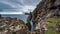 Sliding camera timelapse of steep coast of Faroe Islands