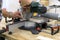 Sliding compound miter saw with laser pointer