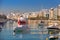 Sliema, Malta - January 10, 2020: Architecture of the harbor in Sliema city at sunrise, Malta