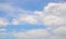 Slightly Cumulus clouds on the blue sky showing white soft texture pattern.