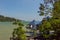 Slightly rickety stilt bungalows with blue pyramid roofs on the Phuket coast facing the Andaman Sea