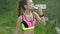 slim athletic woman drinks water after practicing