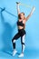 Slim awesome good looking woman training with jump rope