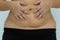 Slim and fit figure after the longitudinal caesarean section. Scar after a Caesarean section, Bikini line.