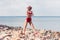 slim stylish girl posing in vintage red bikini