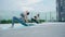 Slim woman practicing yoga on the balcony of her condo. Asian woman doing exercises in morning. balance, meditation, relaxation,