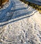 Slippery icy road in the middle of winter. Shallow depth of field