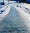 Slippery icy road in the middle of winter. Shallow depth of field