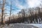 Slippery winding road in a winter mountain forest