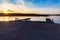 Slipway or boat ramp on Ed Zorinsky lake at sunset in winter