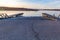 Slipway or boat ramp on Ed Zorinsky lake at sunset in winter