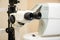 Slit lamp in diagnostic office of doctor ophthalmologist. Ophthalmic diagnostic microscopic medical equipment to diagnose cataract