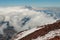 Slope of Avachinsky Volcano. Red volcanic rocks.