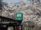 Slope car passing through tunnel of cherry blossom (Sakura)