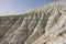 The slope of Mount Bokty from limestone and chalk deposits in the Kazakh steppe, the relief of the hillside