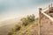 Slope of Mount Vesuvius and view over Naples Bay on a foggy day