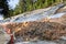 Slope retention construction work being carried out to manage landslide