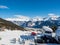 Slope view with funicular and snow groomer in winter in resort Ladis, Fiss, Serfaus in ski resort in Tyrol