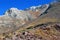 Slopes and bright blue sky in the mountains of Tien Shan in August