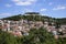 Sloping houses with the fortress at the top, in Sibenik, Croatia, Europe, situated next to the mouth of the river Krka