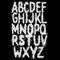 Sloppy grunge alphabet on black background.Art font.