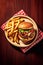 sloppy joe burger with french fries on a plate