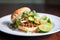 sloppy joe with a twist of lime, cilantro garnish