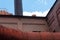 Sloss Furnaces National Historic Landmark, Birmingham Alabama USA, brick industrial building with smokestack and large pipes, blue